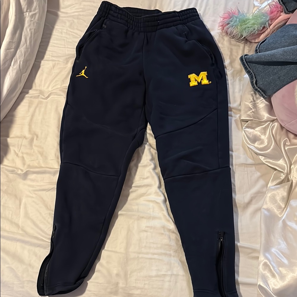 Jordan navy sweatpants with yellow Michigan and Jordan logo